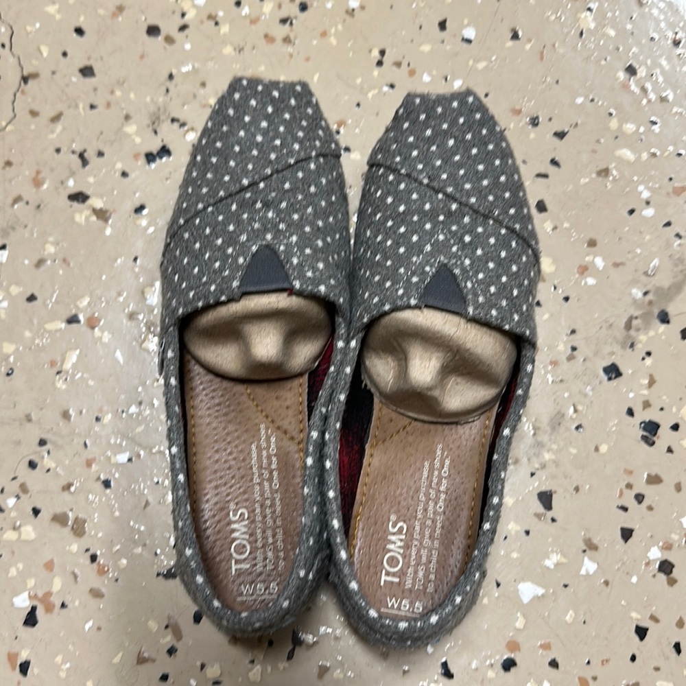 TOMS grey dot slip ons